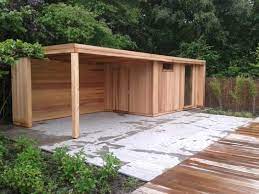 tuinhuis schuurtje of berging met platdak en luifel lounge gedeelte moderne of rustieke uitstraling met een strak design o tuinhuizen tuinhuis tuinhuisjes