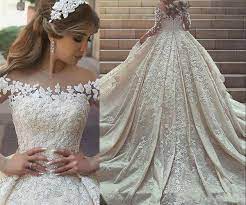 Discount Luxury Saudi Arabia Dubai Wedding Dresses Lace Illusion Corset Long Sleeve Bride Country Dubai Wedding Dress Wedding Dresses Low Cost Wedding Dresses