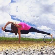 The Dharma Yoga Wheel Http Www Dharmayogawheel Com Yoga Positionen Yoga Wheel Yoga Rad