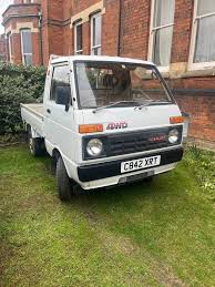 Image result for Shooting White 1964 Daihatsu