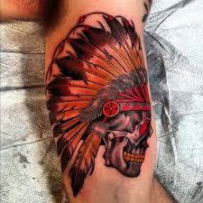 Many choose to gravitate towards female native american. Colorful Skull In An Indian Headdress Tattoo On Arm Tattooimages Biz