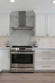 All White Kitchen Remodel By Gayler Design Build Kitchen Quartz Backsplash Marble Backsplash Kitchen White Kitchen Remodeling
