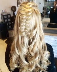 This braided updo is great to protect your curls whiel you dance the night away on your big night. 27 Prettiest Half Up Half Down Prom Hairstyles For 2020