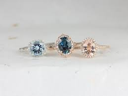 James allen 14k rose gold blue sapphire and aquamarine asymmetrical ring, $1,040, jamesallen.com april: Gemstone Engagement Rings