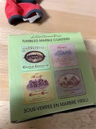 The personalized photo coasters are crafted of 4x4tumbled marble, with cork backing. Rosehill Direct La Cote Tumbled Marble Coasters 4 Piece