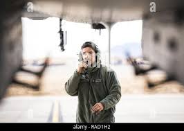 A crew chief communicates with a pilot while launching aircraft from Moron  Air Base, Spain in support of Operation ENDURING FREEDOM. Subject  Operation/Series: ENDURING FREEDOM Base: Moron Air Base State: Sevilla  Country: