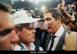 Alabama coach Gene Stallings, right, and linebacker coach Jeff Rouzie yell  at the defense as they fall behind Soutern Mississippi