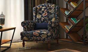 Buy Danon Wingback Chair Dusky Leaf Online In India Wooden Street Wooden Lounge Chair Chair Lounge Chair Design