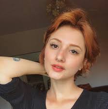 Celebs love short hairstyles, these haircuts look great for the spring and summer and you can transform your look for the new year. Redhead Girl Short Hair Girl And Septo Percing Image 6947585 On Favim Com
