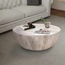 Distressed coffee table is one type of a table that complements the interior of the living room. The Urban Port Distressed Mango Wood Coffee Table In Round Shape Washed Light Brown Upt 32181 Benzara Com