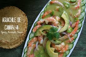 If it's a particularly hot day, rest your shellfish on a plate of ice. Aguachile Shrimp With Spicy Hass Avocado Sauce