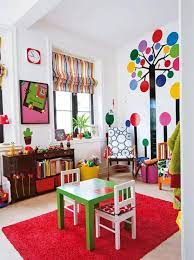 Crate & kids (you can find a similar version of the table here, and a whole rainbow of kids' chairs) multicolored bamboo wall clock: 8 Bright And Colorful Playrooms