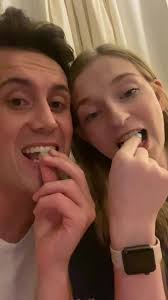 Candy Bar Couple Stand in Fron of Proposal