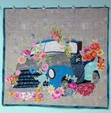 And yeah they have kits for most of their patterns i think. Laura Heine Collage Quilts