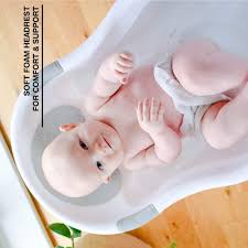 Your baby's first bath can be a time filled with smiles and laughter or tears and wails; Nuby Baby Bath With Built In Seat And Soft Headrest Baby Slide Baby Bath Headrest