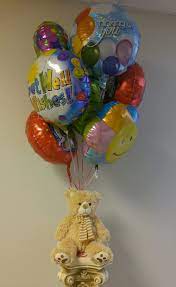 Arranged by a florist with a mix of get well mylar balloons and latex balloons. Get Well Balloon Bunch Flowers 2 U