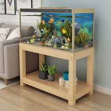 The fish tank will sit on wooden vertical support with foam insulation between the tank and the stand. Fish Tank Bottom Cabinet Fish Tank Cabinet Aquarium Shelf Fish Tank Table Solid Wood Base Fish Cylinder Solid Wood Fish Tank Shelf