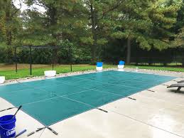Solar covers / blankets / rings. Solid Vinyl Vs Mesh Inground Winter Pool Covers Which Is Better