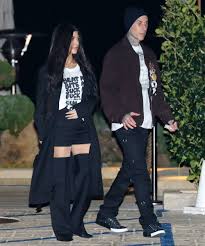 The image shows barker looking up, waiting in. Is Travis Barker New True Romance Tattoo For Kourtney