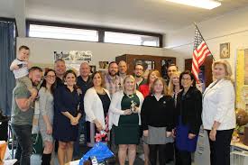 Ms. Mallory Lepere, Student Service Coordinator at The Prout School,  received the Golden Apple Award last week at a surprise ceremony at the  school. The Golden Apple Award