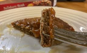 In a separate bowl mix flour, broth, soup mix, and pepper together. The History Of Salisbury Steak And Central New York Exploring Upstate