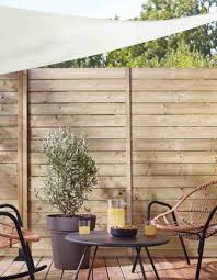 Aménagement petit jardin avec clôtures design en bois. Amenagement Petit Jardin 5 Astuces Pour L Amenager Elle Decoration
