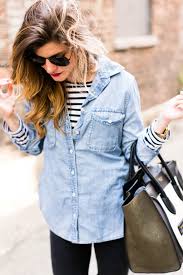 You can wear the dress shirt tucked or untucked, sleeves showing past the sweater cuffs or hidden under them — play with it to your heart's content. How To Wear A Denim Shirt 13 Ways To Style Chambray