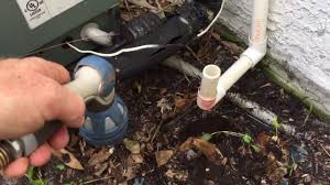 Stand clear as you remove the plug and as you work on the clog. How To Flush Out Your Ac Water Drain Line Air Conditioning Tip Youtube