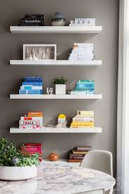 Our 30 Clutter Free Marie Kondo Approved Bookshelves Homepolish Dining Room Shelves Dining Room Floating Shelves Shelves