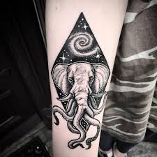 Also, it gives simplicity to the design and if you want you will be able to color it in the future. Elephant And Galaxy Tattoo Tattoogrid Net