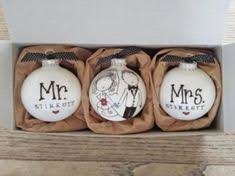 Make these custom wine bottles for the newly married couple to keep as home décor items. 41 Wedding Gift Ideas Wedding Gifts Personalized Door Mats Wedding Gifts For Bride And Groom