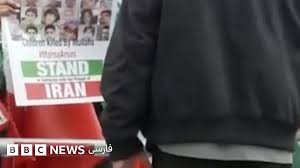 درگیری بین مخالفان و موافقان حکومت در حاشیه بازی ایران و بلژیک