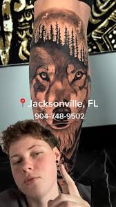 Fun black and grey forearm tattoo I got to do the other day! ￼ A cross made  of nails, and some tiger lilies tattoo for this nice lady. lol. ￼ I'm gonna