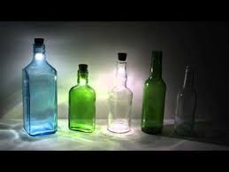 How To Transform A Glass Bottle Into A Simple Decorative Lantern Diy Crafts Led Bottle Light Bottle Lights Bottle