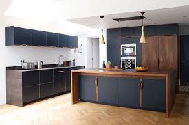From paint to flooring, kitchen larders and even cabinets, get some inspiration from these dark kitchen design ideas to inspire your decorating choices today. How To Team Dark Kitchen Units With A Dark Worktop Houzz Uk