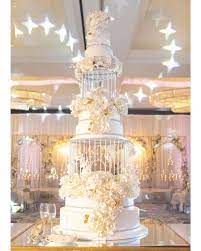 Charlyelynne On Instagram Our Beautiful Bird Cage Wedding Cake By Cakesbyginahou Gina Herself Custom Desi Feather Wedding Cake Wedding Cakes Wedding