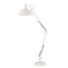 Anthropologie's luna floor lamp is a classic arc lamp with a striking twist. You Need An Arc Floor Lamp For Your Dining Table Architectural Digest