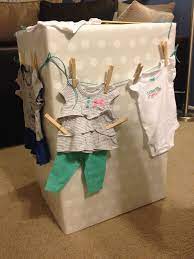Baby Shower Gift Decorated A Large Box With Outfits Hanging On A Clothesline Easy And Fun Pre Baby Shower Wrapping Best Baby Shower Gifts Baby Shower Gifts