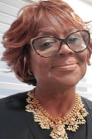 Drive by surprise gathering for our pastor who recently received her  Doctorate degree.