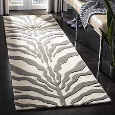 Durch ein klares und deutlich schöneres streifenmuster aus. Safavieh Zebra Gestreifter Teppich Cam709 Handgetufteter Wolle Laufer Elfenbein Dunkelgrau 76 X 243 Cm Amazon De Kuche Haushalt Wohnen