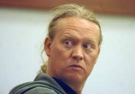 Denny pleads innocent to murder