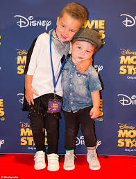 Guy Sebastian's sons Hudson and Archer attend event with mother Jules