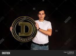 Get the latest dogecoin price, live doge price chart, historical data, market cap, news, and other vital information to help you with live dogecoin (doge) price, historical chart & dogecoin market cap. Young Guy Holds Symbol Image Photo Free Trial Bigstock