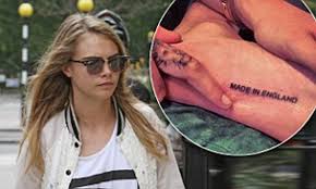 Cara delevingne is taking patriotism to a whole new level! Cara Delevingne Continues With Her Ink Addiction As She Gets A New Tattoo On The Sole Of Her Foot Daily Mail Online
