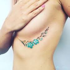 After a mastectomy, surgery or breast reconstruction, women may feel unhappy about their scars or new body shape. Flower Under The Breast Tattoo Pictures Tattoo Pictures