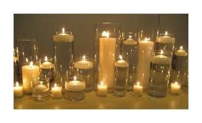 Pin On Floating Candle Centerpieces