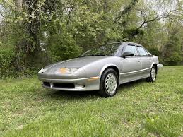 Image result for Black Gold 1995 Saturn