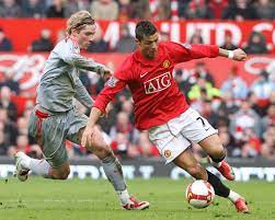 Manchester England March 14 Cristiano Ronaldo R Of Manchester United Clashes With Fernando Torres Of Liverpool Ronaldo Football Cristiano Ronaldo Ronaldo