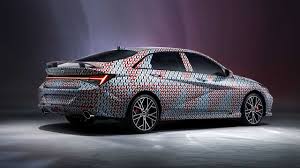 Check spelling or type a new query. 2022 Hyundai Elantra N Teaser Photos Show A Camouflaged Sports Sedan