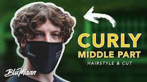 Middle parts are versatile in the sense that you can style your hair relaxed and wavy or sleek and straight. Curly Middle Part Hairstyle Cut For Men Youtube